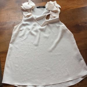 Blush racerback top with florettes.